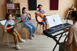 Children playing instruments in a music class.